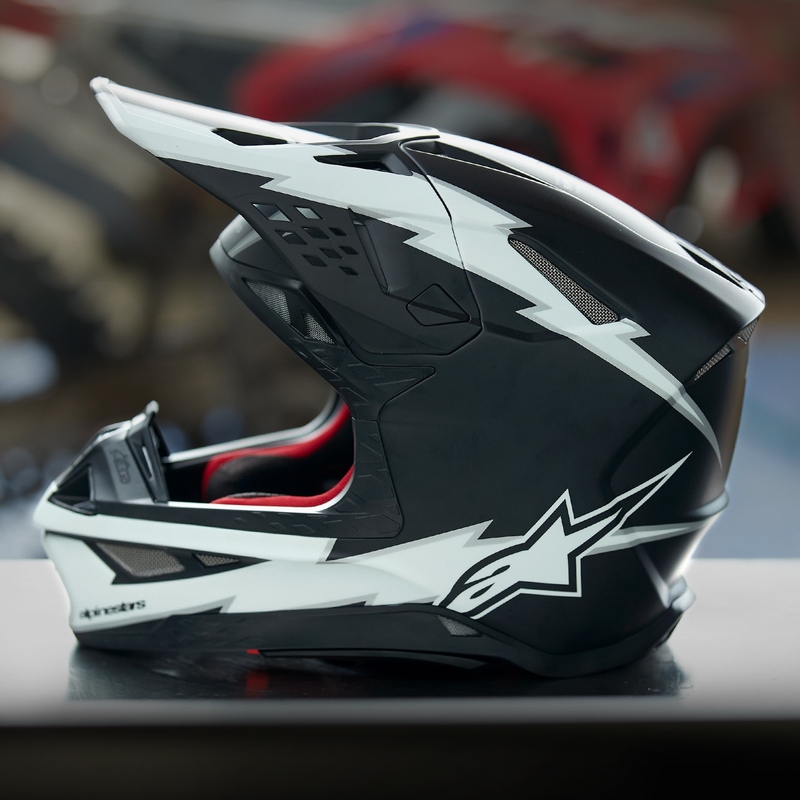 Casca de motocross Alpinestars Supertech S-M10 Ampress alb-negru mat
