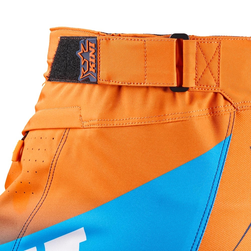Pantaloni motocross KINI Red Bull 1.0 Rallye albastru-portocaliu